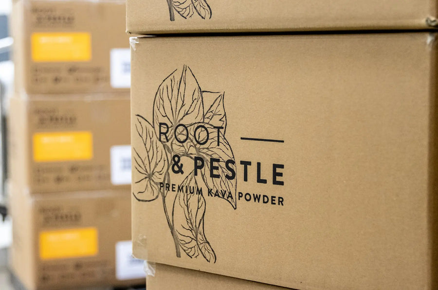Sealed and labelled Root and Pestle cartons stacked ready for dispatch